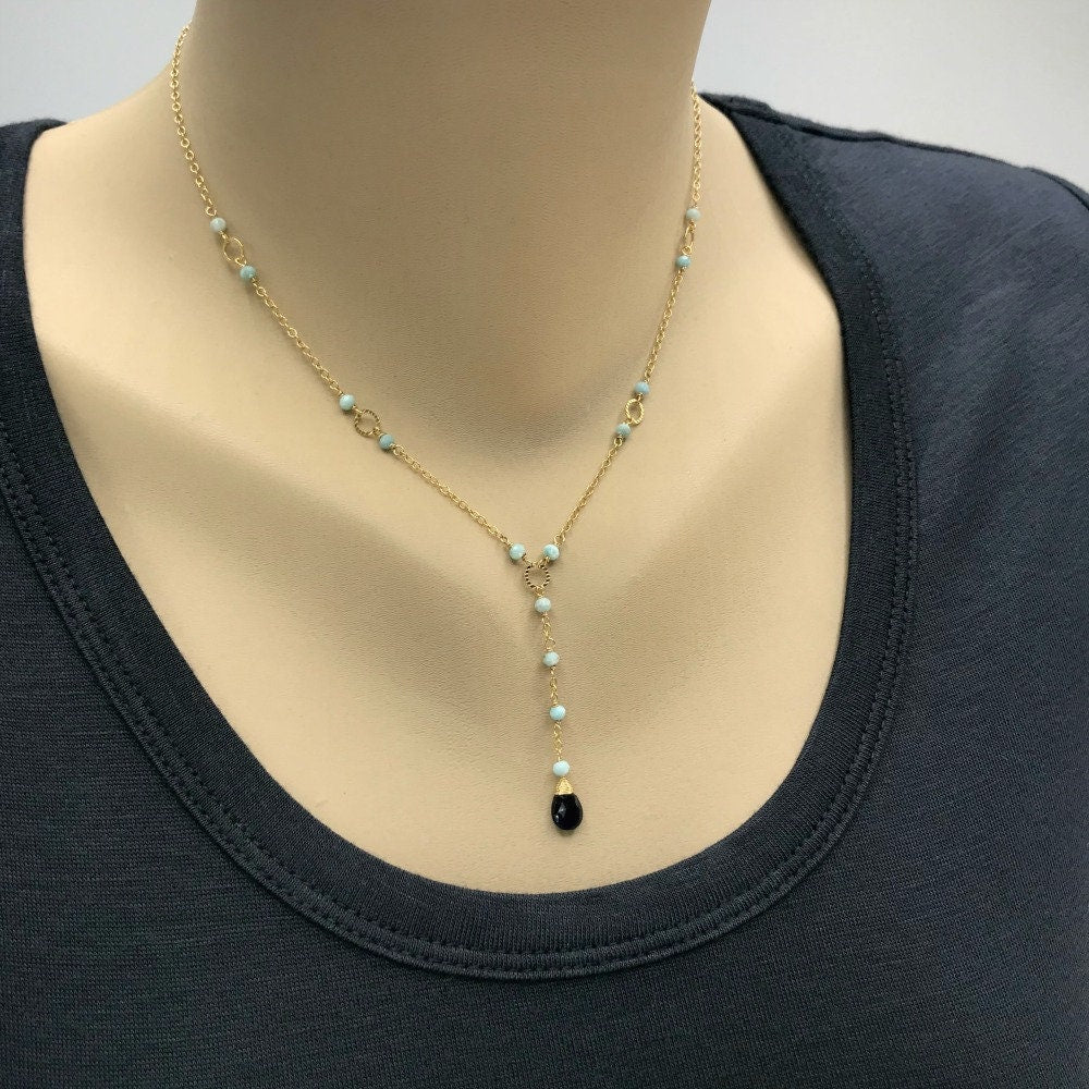 Iolite is known for its ability to enhance intuition, balance emotions, and promote spiritual growth. It is often associated with inner vision and self-discovery, helping to clear mental fog and improve decision-making.
Larimar is a calming stone that carries the soothing energy of the ocean. It promotes relaxation, peace, and emotional healing. It is also believed to aid communication and self-expression, making it perfect for those seeking clarity and understanding in their relationships.